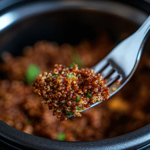Fluffing red quinoa in Instant Pot with fork