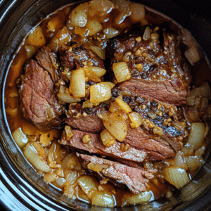 Searing and layering slow cooker tri tip over onions